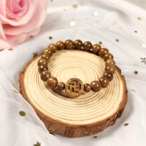 Vòng Tay Trầm Hương Tốc Thiên Nhiên Gắn Charm Chữ Vạn - Thắng Giang