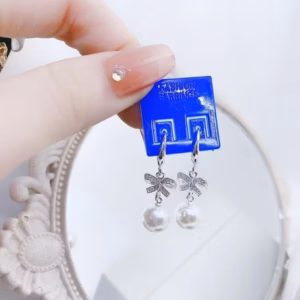 Bông Tai Nơ Bạc Ta Gắn Trai San Hô - Thắng Giang