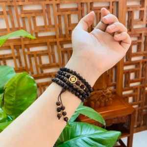 Vòng Tay Trầm Hương Sánh Chìm Thiên Nhiên Phối Bánh Xe Pháp Luân Bạc Ta Xi Vàng 24 Kara - Thắng Giang