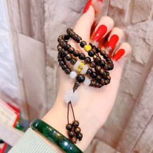 Vòng Tay Trầm Sánh Chìm Phối Charm Vàng Tay 24 Kara Và Cẩm Thạch - Thắng Giang